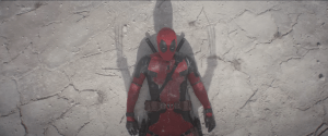 Image of Deadpool laying on the ground from Deadpool and Wolvering