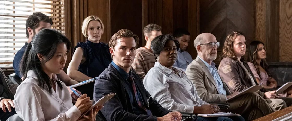 Scene from Clint Eastwood’s Juror #2, featuring the jury, including Nicholas Hoult, in a tense courtroom drama exploring guilt and morality.